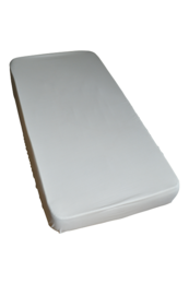Natural-colored crib cover sheet made of soft, breathable material for a comfortable sleeping environment for your baby.