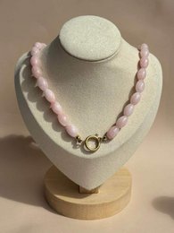 # Product Description
Baby pink beaded necklace with soft rose quartz stones and gold-tone clasp closure.