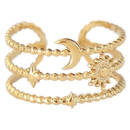 Gold ring moon sun star
