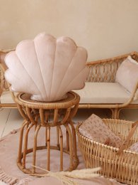 Soft, plush velvet cushion in a latte color with a shell-shaped design, perfect for adding a cozy, textural accent to any room.