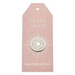Stainless steel coin with a mandala design, featuring a sun-like pattern representing "love". The coin is described as a "lucky coin".