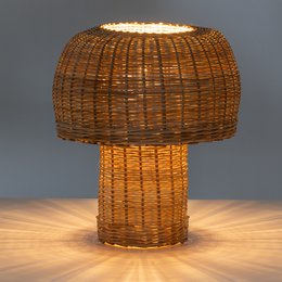Woven rattan desk lamp with a round, dome-shaped shade and a tall, cylindrical base.