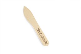 A wooden cutlery item with the text "Tartipique" printed on it. The item appears to be a wooden knife or utensil.