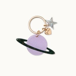 Keychain with a purple planet-shaped charm and metallic star charms, suitable for kids.