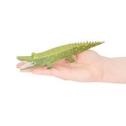  A green crocodile-shaped postcard with a playful, whimsical design. The postcard features a detailed illustration of a crocodile with textured scales and a friendly expression.