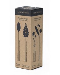 Tall, cylindrical black tea box with botanical illustrations of leaves and stems on a plain brown background.