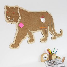 Cork board with a tiger design, suitable for wall art or office decor. Features a brown tiger shape with pink accents and a small circular design element.