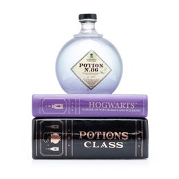 Round glass candle, purple and black, Harry Potter Potions book design, magical themed scent candle