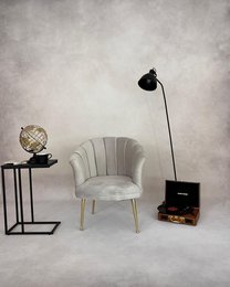Luxury velvet shell armchair in various colors including black, gold, pink, cream, gray, baby blue, mokka, green, and brown. The chair features a curved shell design and comes with different leg options such as gold and black.