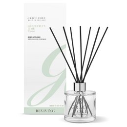 A tall, cylindrical glass diffuser bottle filled with a clear liquid and containing black reed sticks. The bottle has a white label with the text "Grapefruit, Lime & Mint Diffuser 200ml" and "Reviving" printed on it. The diffuser is designed to release fragrance into the air.