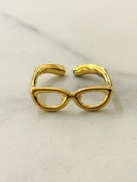  Stainless steel glasses ring in gold and silver colors, designed as a stackable accessory.