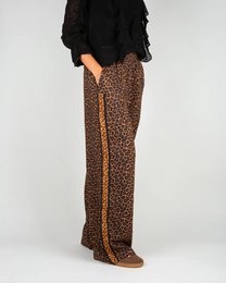 Pantaloni fluidi da donna con stampa leopardata marrone