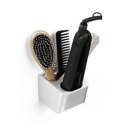 A sleek, modern straightener holder in silver, gray, or black colors. Designed to neatly store and organize hair styling tools.