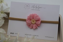  Pink flower hairband for kids, featuring a soft, textured flower with a golden center.