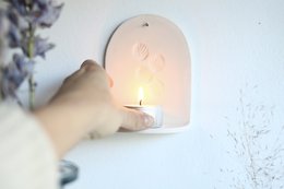 Ceramiczny wieszak ścienny ze świecą