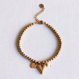 Beaded armbånd med hjerter og mini perle