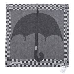 Black and white umbrella-shaped graphic design on a tea towel.