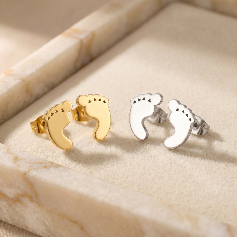 Bebe - Pendientes con forma de pies de bebé para mujer