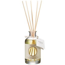 A 200 ml room fragrance diffuser with a floral, woody scent. Features a glass bottle with a wooden cap and reed sticks for diffusing the fragrance.