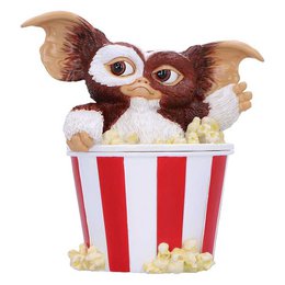  Gremlins - Gizmo Popcorn Feast - storage box (Nemesis Now). Collectible figurine of the character Gizmo from the Gremlins movie, sitting in a striped popcorn container. The figurine features Gizmo's distinctive furry appearance and large eyes.