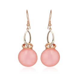 Rose gold drop earrings with round pink glass beads.