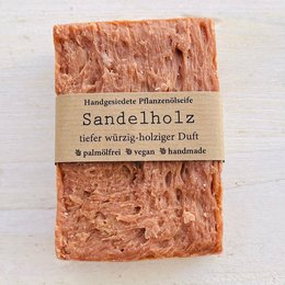 Handcrafted sandalwood soap bar, made with natural ingredients including sandalwood essential oil. Gentle cleansing and moisturizing for skin.