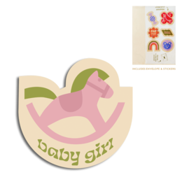 A pink and green wooden rocking horse-shaped card with the text "baby girl" printed on it. The card features a simple, minimalist design with a playful, whimsical aesthetic suitable for a baby shower or newborn celebration.