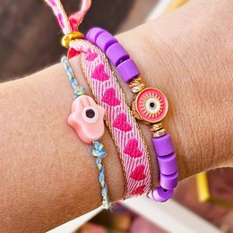 Bracciale Hamsa intrecciato a mano rosa