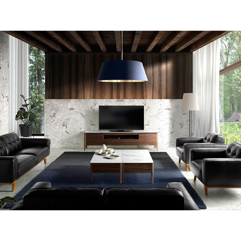 Armchair upholstered in leather and Walnut wood legs