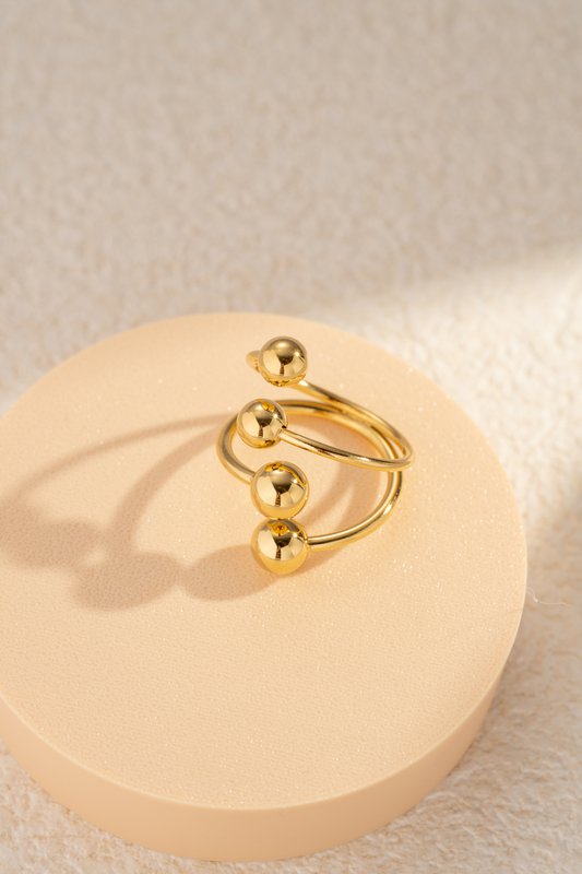 Bague acier inoxydable ajustable moderne boules rondes alignées dorée