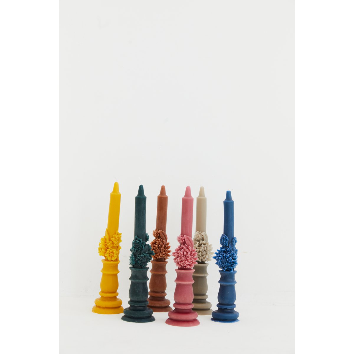 Raw beeswax candela with flowers