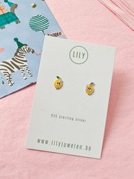 Cute lemon-shaped stud earrings in a vibrant yellow color, perfect for adding a playful touch to any kids' outfit.