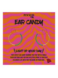 Gold and mint green beaded hoop earrings with a vibrant, psychedelic pattern.
