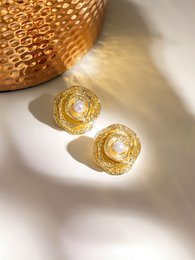 Gold-plated botanical stud earrings with pearl centers, round shape, elegant jewelry