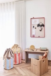Set of 2 woven storage baskets in a striped pattern with a scalloped design. The baskets have a drawstring closure and are suitable for storing various items.