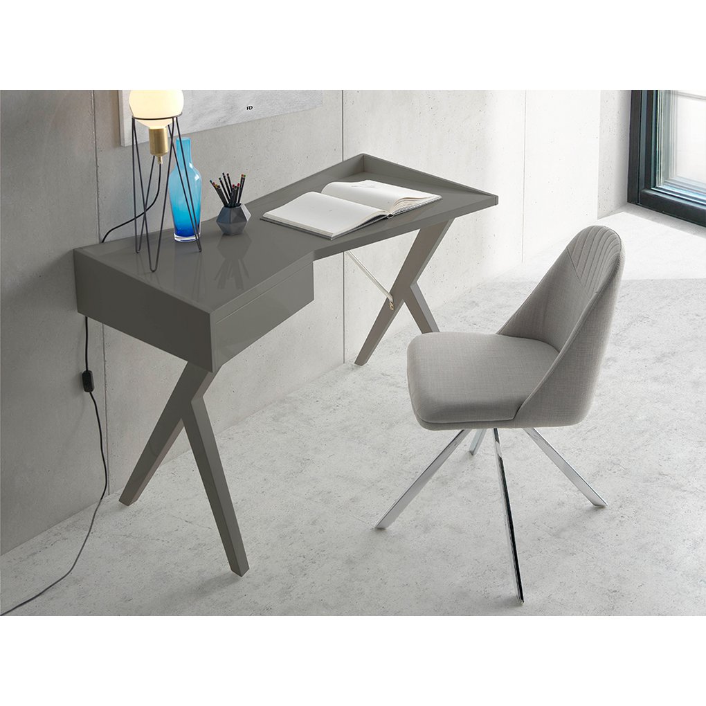 Swivel chair upholstered in fabric with chromed steel legs