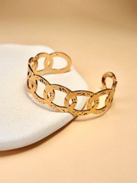 Golden Rush armband met elkaar verweven gebeeldhouwd