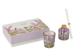 Floral-patterned gift set with scented candle and oil, in pink and purple tones.