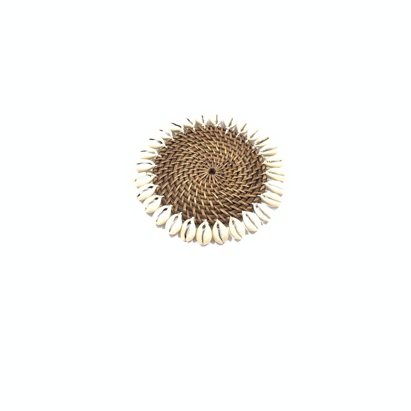 Rattan coaster with cowrie shells