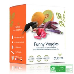 Organic vegetable growing kit containing unusual vegetables, including colorful peppers, radishes, and other produce. Includes growing medium, seeds, and instructions.