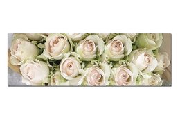 A delicate and elegant table runner featuring a beautiful arrangement of soft pink roses on a neutral background.
