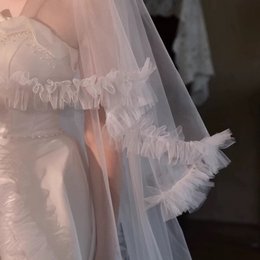 Welon ślubny o długości katedralnej z loterią
