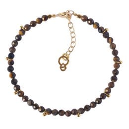 "Courage Booster" bracelet made of brown and gold-colored beads, featuring a charm design.