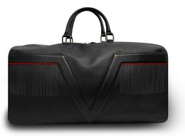 Black leather travel bag with fringes and red edging, suitable for weekend getaways.