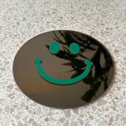 Det lille mørkegrønne smil
