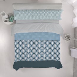  Soft, patterned duvet cover set in shades of blue and white, featuring a geometric design. Suitable for a double bed.
