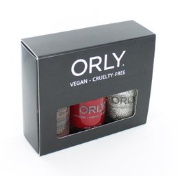 "Three-piece nail polish kit with red, silver glitter, and nude shades. Vegan, cruelty-free formula."