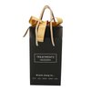 Treatments® gift bag with gold bow