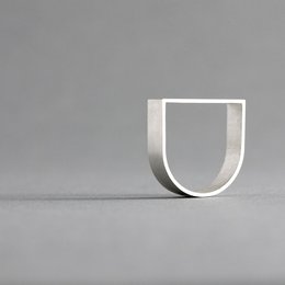 ARK Silver is a sculptural ring inspired by architecture and geometric form.