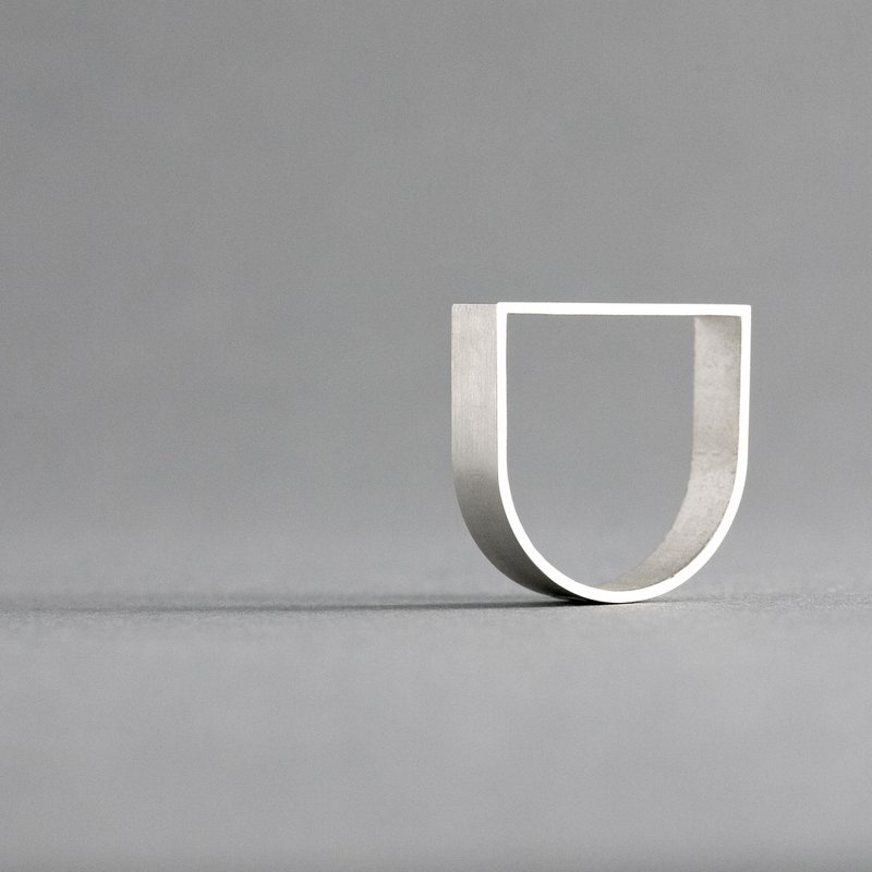 ARK Silver is a sculptural ring inspired by architecture and geometric form.